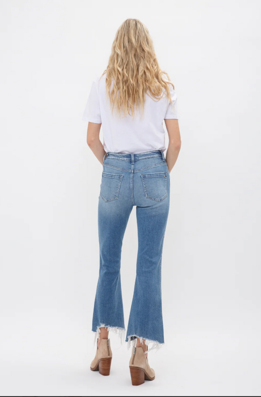 HIGH RISE CROP FLARE W. UNEVEN HEM