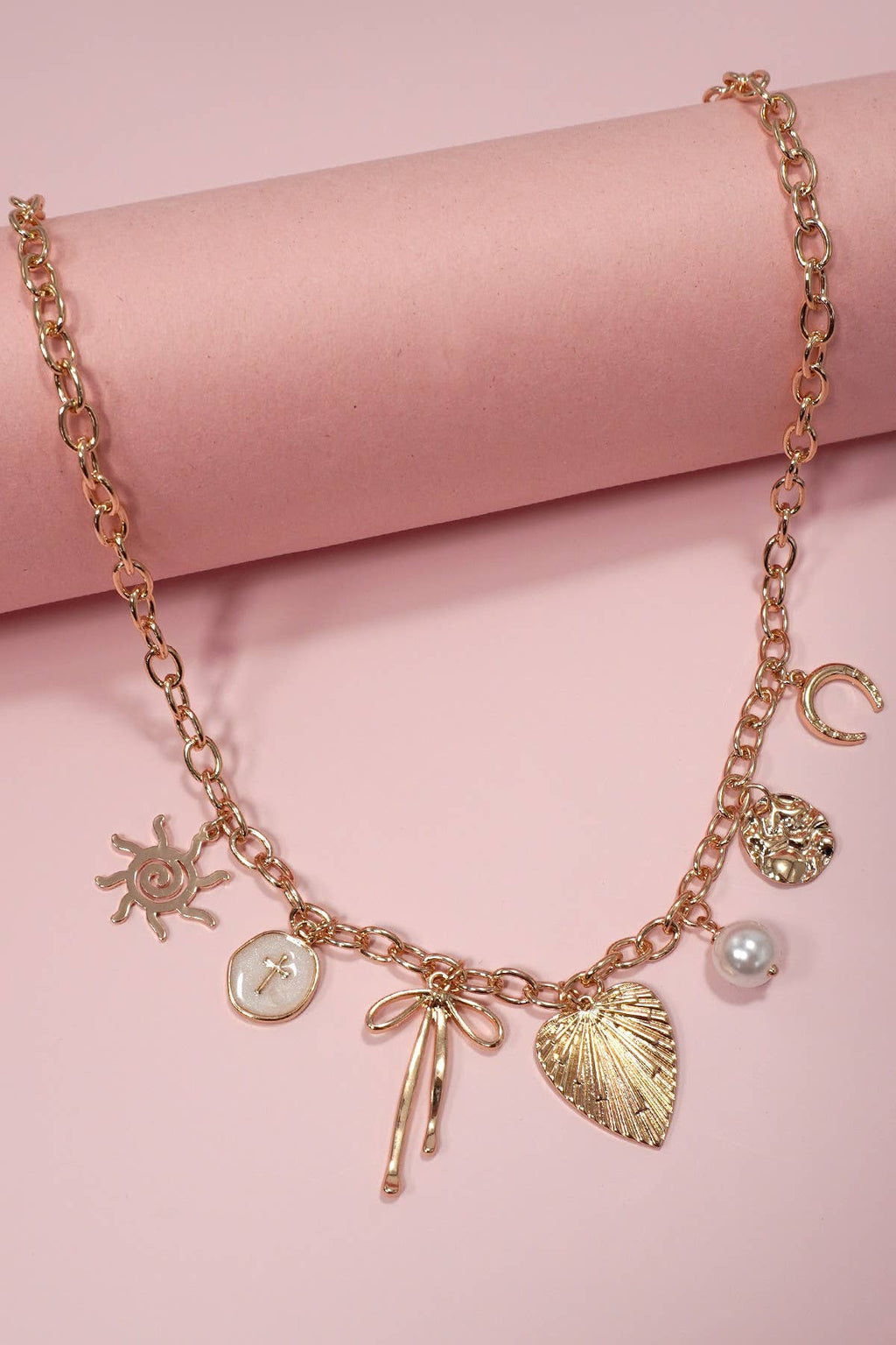 SUN BOW PEARL CROSS DISC U CHARM NECKLACE