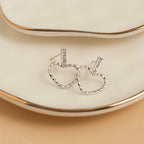Howard's - Waterproof Earrings Narelle Heart Outline Bar Studs