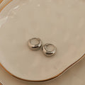 Howard's - Waterproof Earrings Hoop Graduated Huggie in Gold & Steel