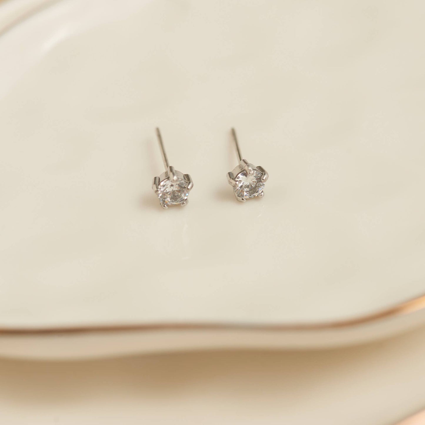 Howard's - Waterproof Earrings 4mm Round Cubic Zirconia Stud Narelle