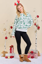 Main Strip - Green & red Christmas Village Sweatshirt
