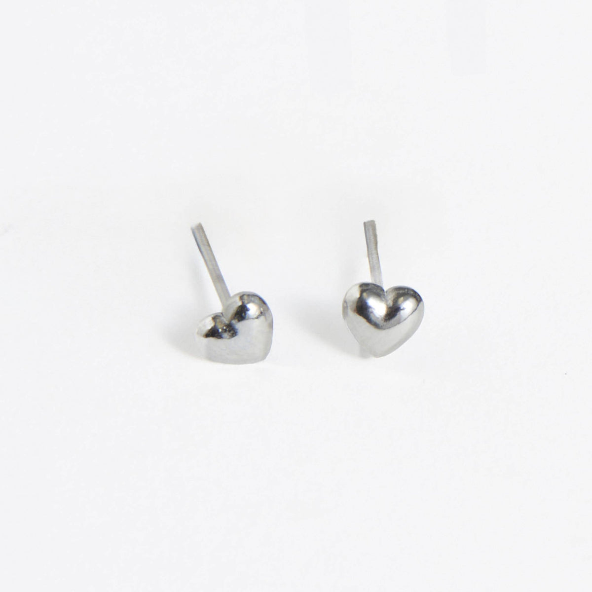 Howard's - Waterproof Earrings Puffy Heart Studs in Gold & Steel