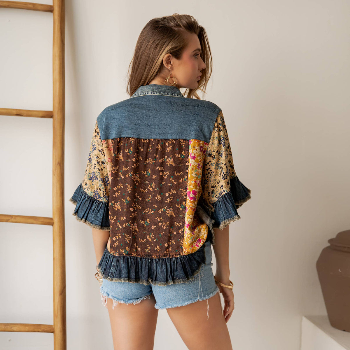 Distressed Denim Crop Jacket with Ruffled Hem
