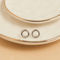 Howard's - Waterproof Earrings Circle Studs Stainless Steel & Gold