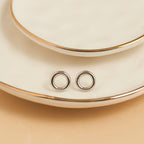 Howard's - Waterproof Earrings Circle Studs Stainless Steel & Gold