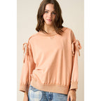BOW APPLIQUE LONG SLEEVE SWEATSHIRT