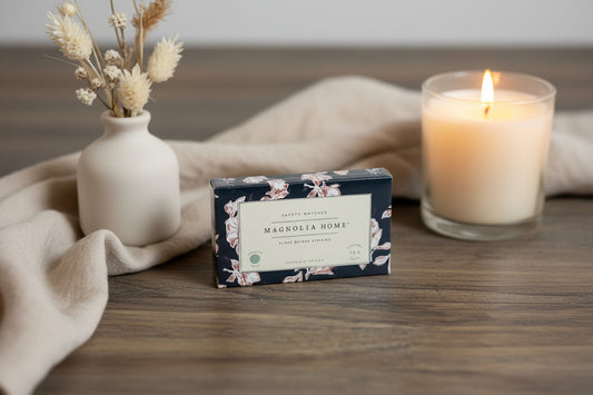 Box with 'Magnolia Home' branding on a wooden surface