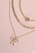 MULTI LAYER PEARL BOW CAHRM NECKLACE |