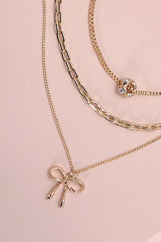 MULTI LAYER PEARL BOW CAHRM NECKLACE |