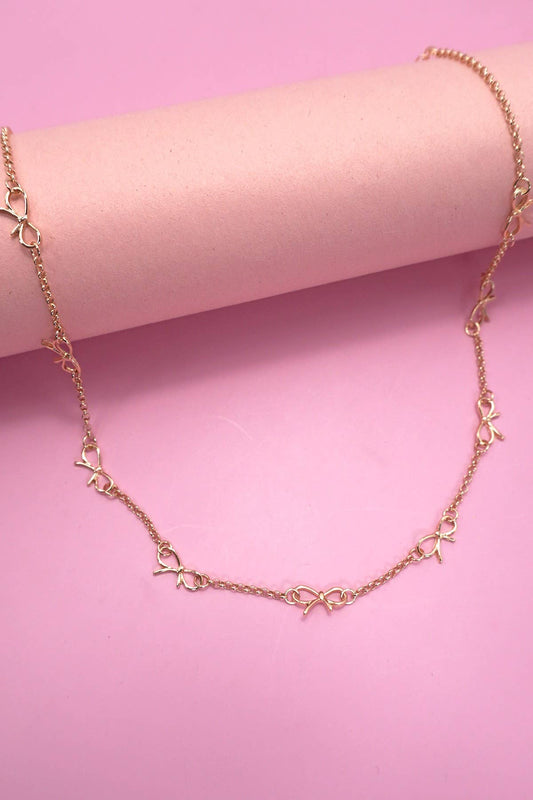 CUTOUT BOW STATION NECKLACE |