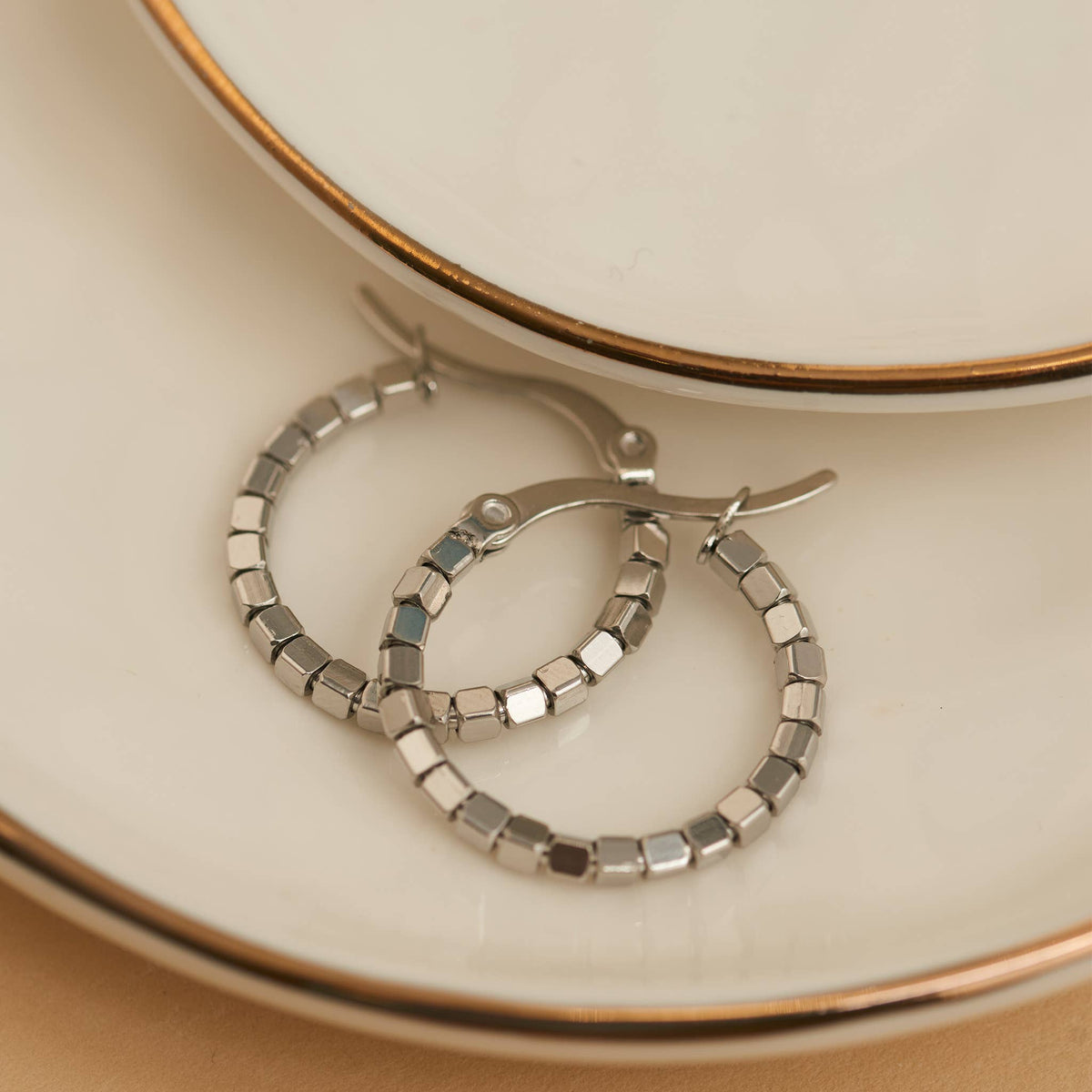 Howard's - Waterproof Earrings Square Beaded Hoop in Gold & Steel