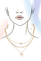 MULTI LAYER PEARL BOW CAHRM NECKLACE |