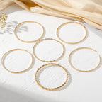 JOSSLYN by wall to wall - Gold Layered Bangle Set - Mixed Texture Stack |