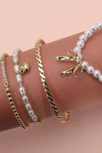 BOW PEARL RHINESTONE BAR STRETCH BANGLE SET |