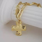 JOSSLYN by wall to wall - NOTABLE HAMMERED CROSS FRONT TOGGLE NECKLACE |