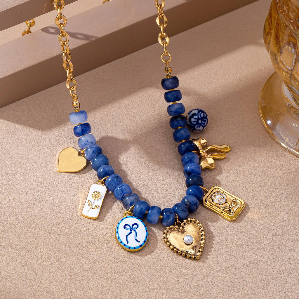 JOSSLYN by wall to wall - Beaded & Gold Chain Multi-Charm Strand Necklace | 80N93913