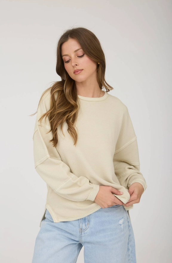 Kapi Exposed Seam Detail Long Sleeve Knit Top