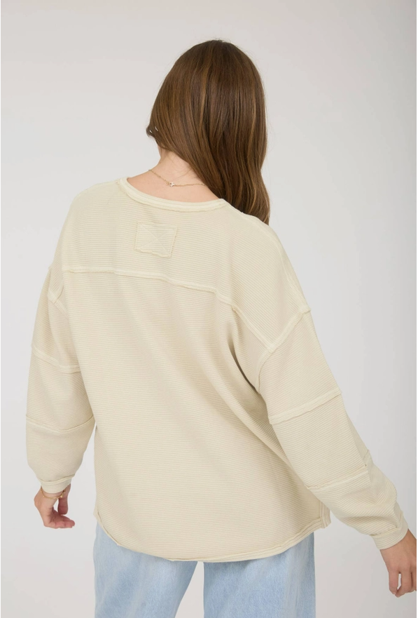Kapi Exposed Seam Detail Long Sleeve Knit Top