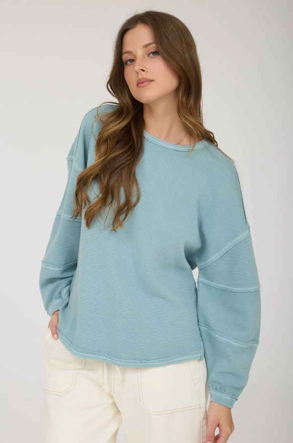 Kapi Exposed Seam Detail Long Sleeve Knit Top