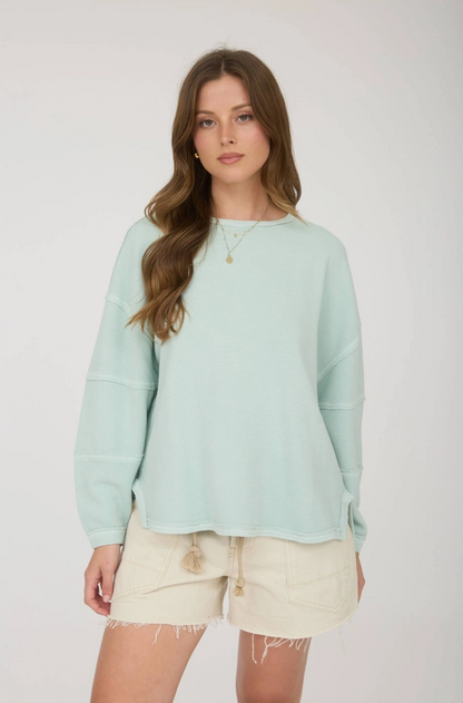 Kapi Exposed Seam Detail Long Sleeve Knit Top