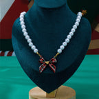 JOSSLYN by wall to wall - Holiday Tartan Plaid Fabric Bow Pearl Necklace | 80N93917