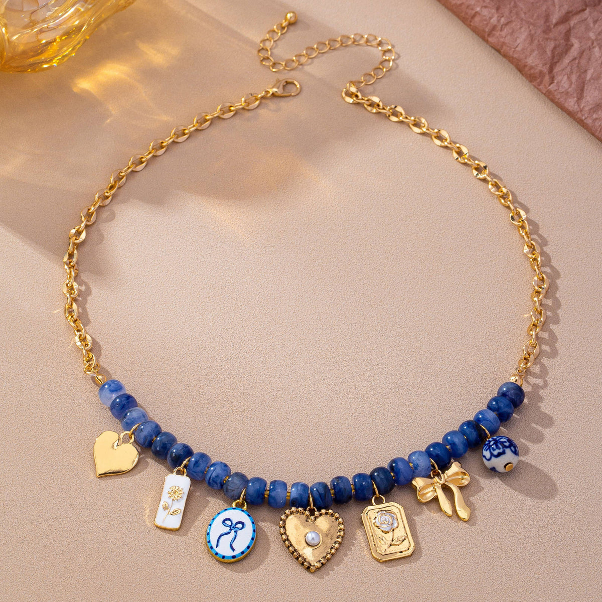 JOSSLYN by wall to wall - Beaded & Gold Chain Multi-Charm Strand Necklace | 80N93913