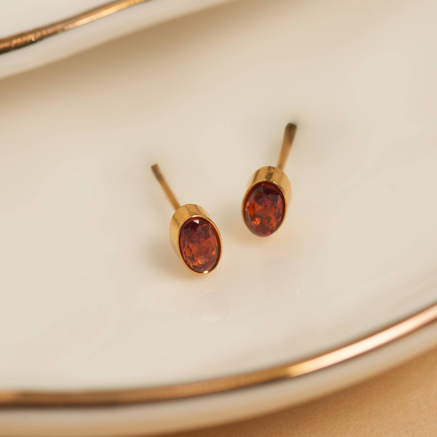 Howard's - Waterproof Earrings Oval Gem Cubic Zirconia 18K Gold Stud