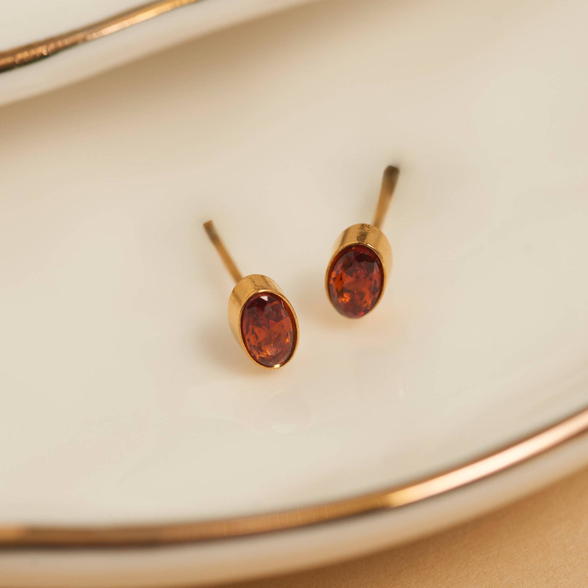 Howard's - Waterproof Earrings Oval Gem Cubic Zirconia 18K Gold Stud