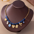 JOSSLYN by wall to wall - Beaded & Gold Chain Multi-Charm Strand Necklace | 80N93913