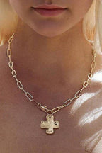 JOSSLYN by wall to wall - NOTABLE HAMMERED CROSS FRONT TOGGLE NECKLACE |