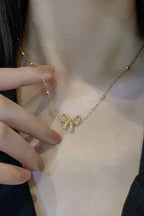 18K STAINLESS STEEL TARNISH FREE BOW NECKLACE |