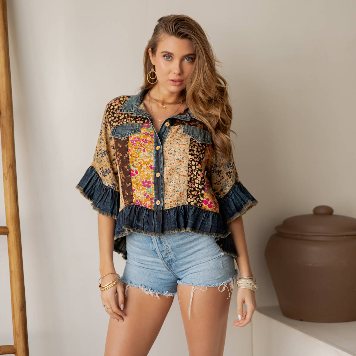 Distressed Denim Crop Jacket with Ruffled Hem