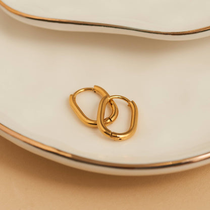 Howard's - Waterproof Earrings Narelle Oval Huggie Hoop Gold & Steel