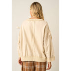 BOW APPLIQUE LONG SLEEVE SWEATSHIRT