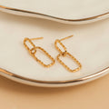 Howard's - Waterproof Earrings 18K Gold Textured Oval Link Dangle Studs