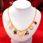 JOSSLYN by wall to wall - Christmas Snowflake bell heart stocking Necklace | 80N93335