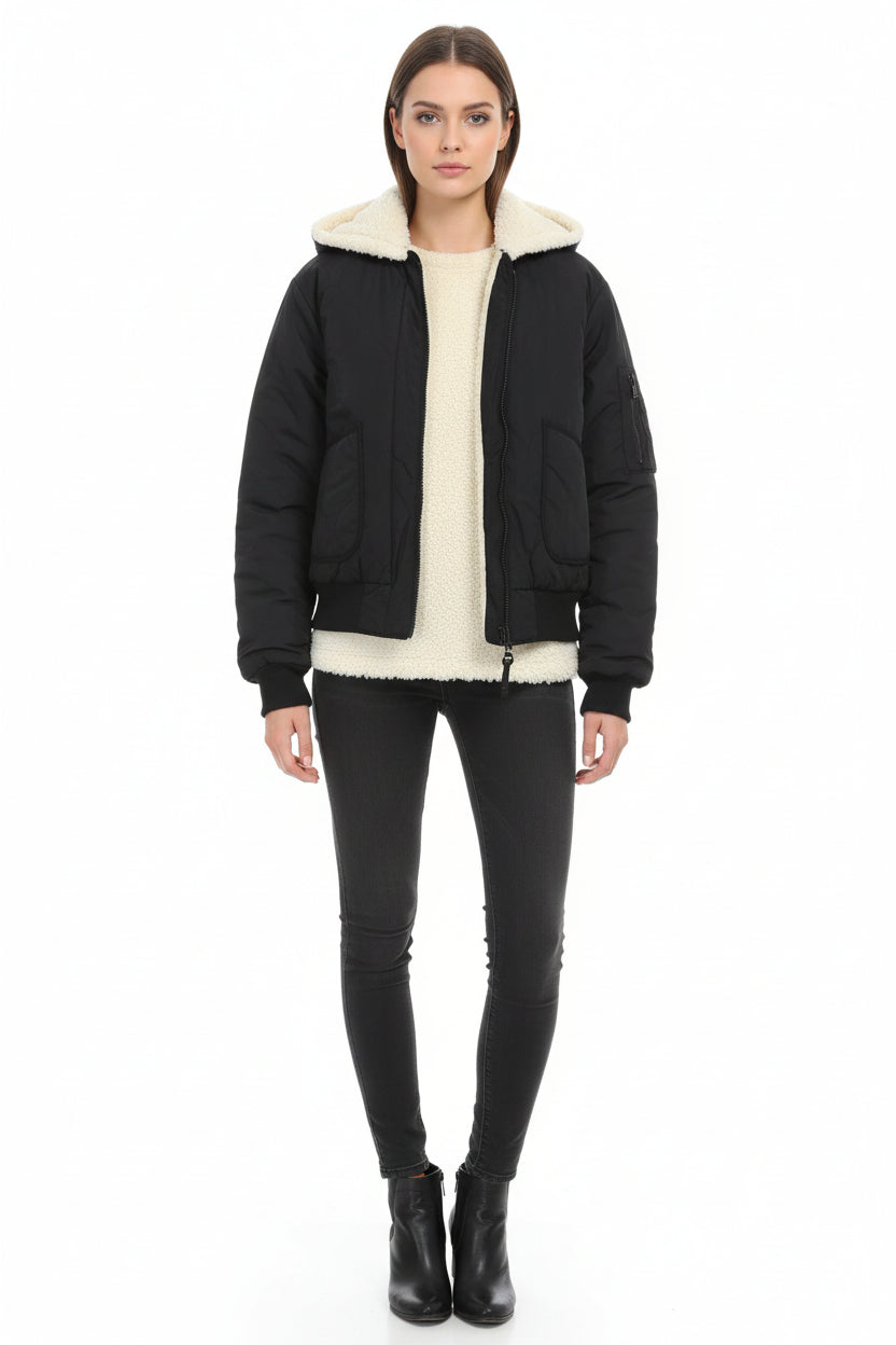 A reversible faux fur coat with a hood, displayed in black, green, and beige colors, with the hood on and detachable collar visible.